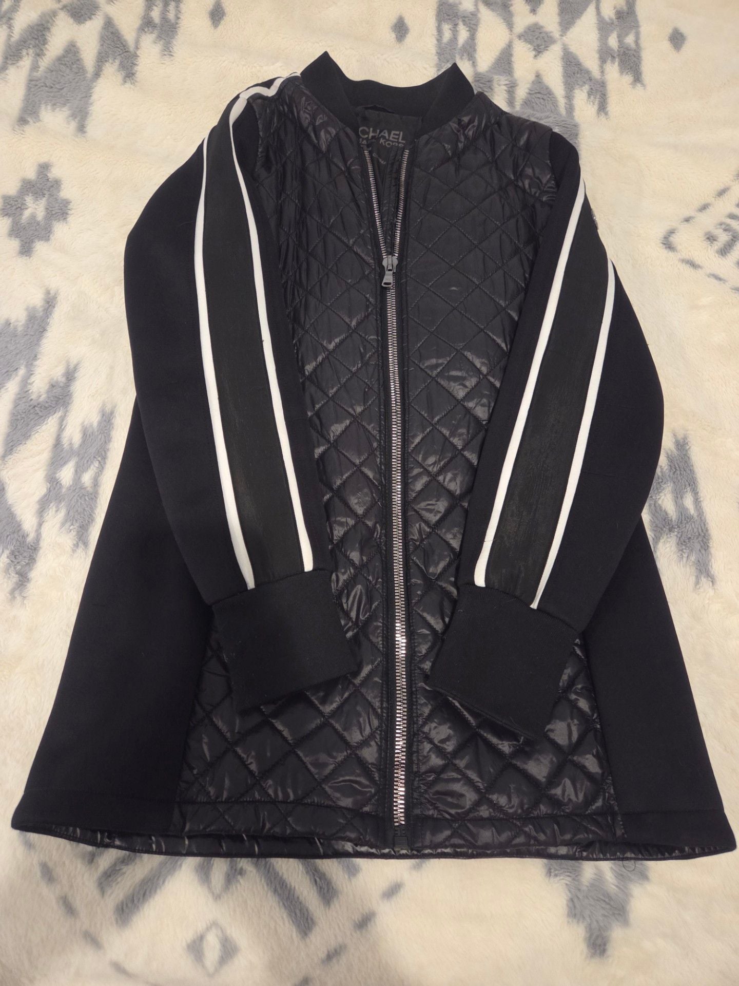 Michael Kors Women's Quilted Bomber Jacket with Contrast Stripe Sleeves.
*Estimated value is $85 on sellraze* 2
