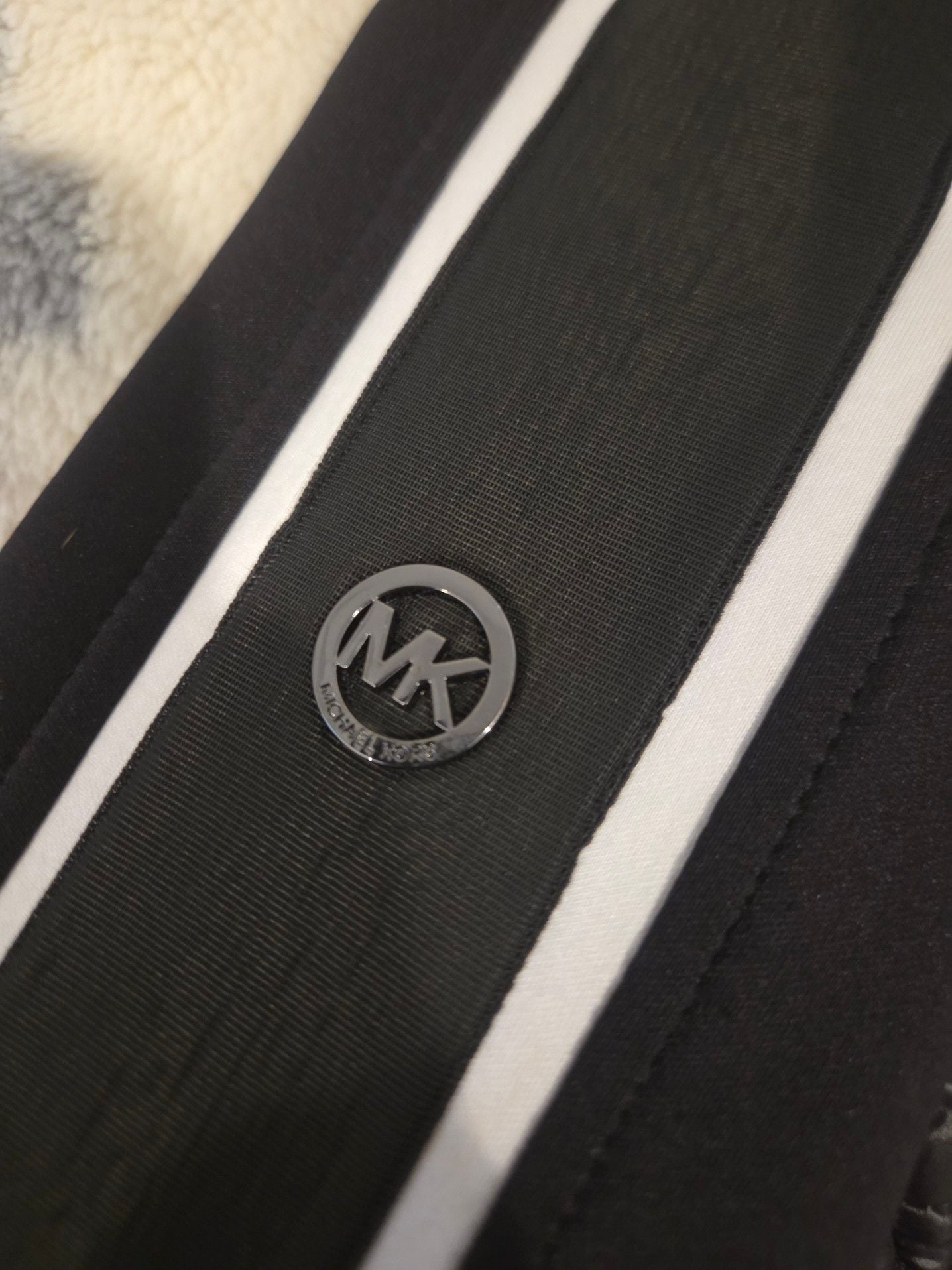 Michael Kors Women's Quilted Bomber Jacket with Contrast Stripe Sleeves.
*Estimated value is $85 on sellraze* 10
