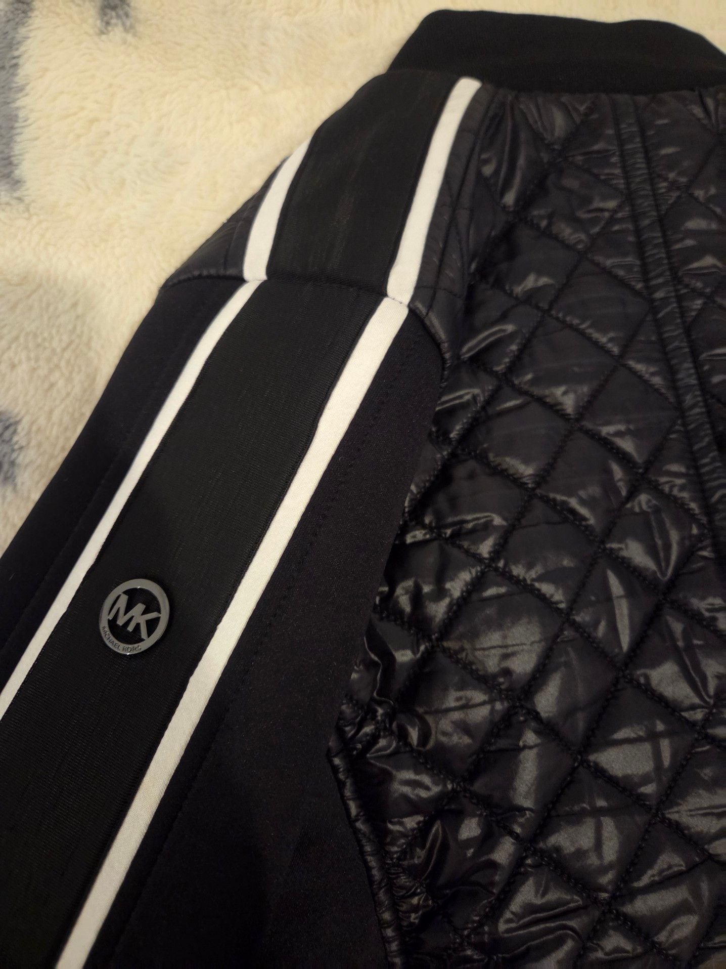 Michael Kors Women's Quilted Bomber Jacket with Contrast Stripe Sleeves.
*Estimated value is $85 on sellraze* 11