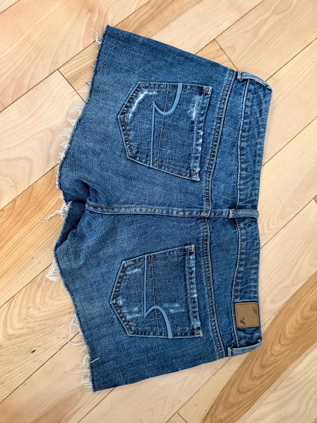 8 American Eagle Distressed Raw Hem Denim Shortie Shorts 1