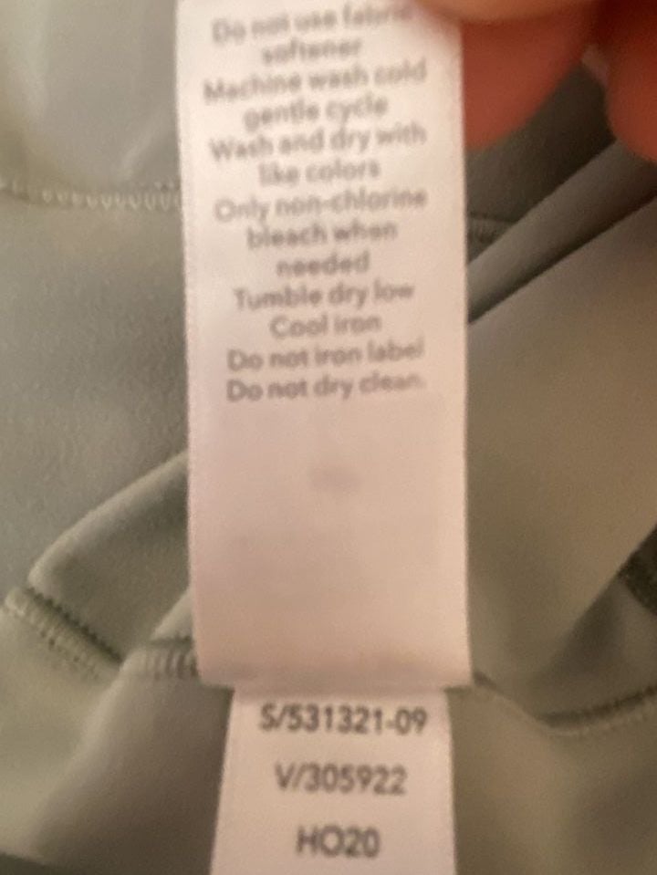 Athleta Salutation Stash Pocket II 7/8 Tight Leggings in Sage Green 10