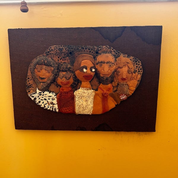 Vtg Mixed Media Clay and Burlap Folk Art Wall Plaque Featuring Group Portrait