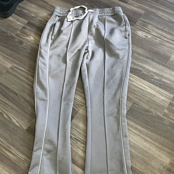 Grey & white track pants with drawstring waist #athleisure #tracksuit.