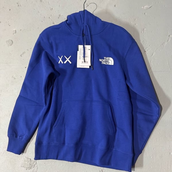 The North Face x KAWS Pullover Hoodie in Bolt Blue
