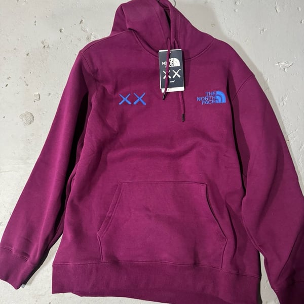 The North Face x KAWS Pullover Hoodie in Pamplona Purple (NF0A7WLIGP5)