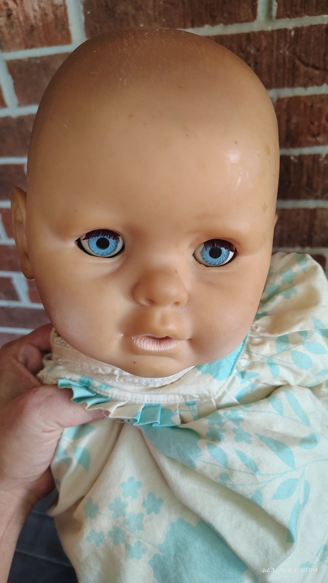 Vintage Vinyl Baby Doll with Blue Sleep Eyes and Floral Dress 3
