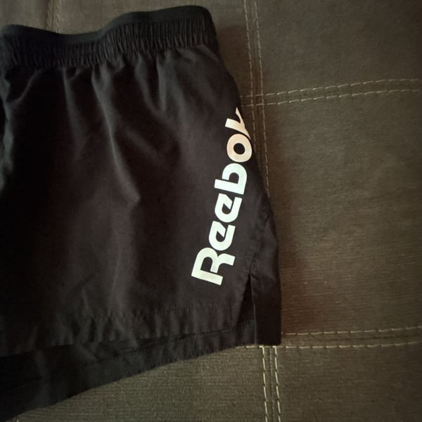 Reebok Women's Winner's Woven Relaxed Running Shorts