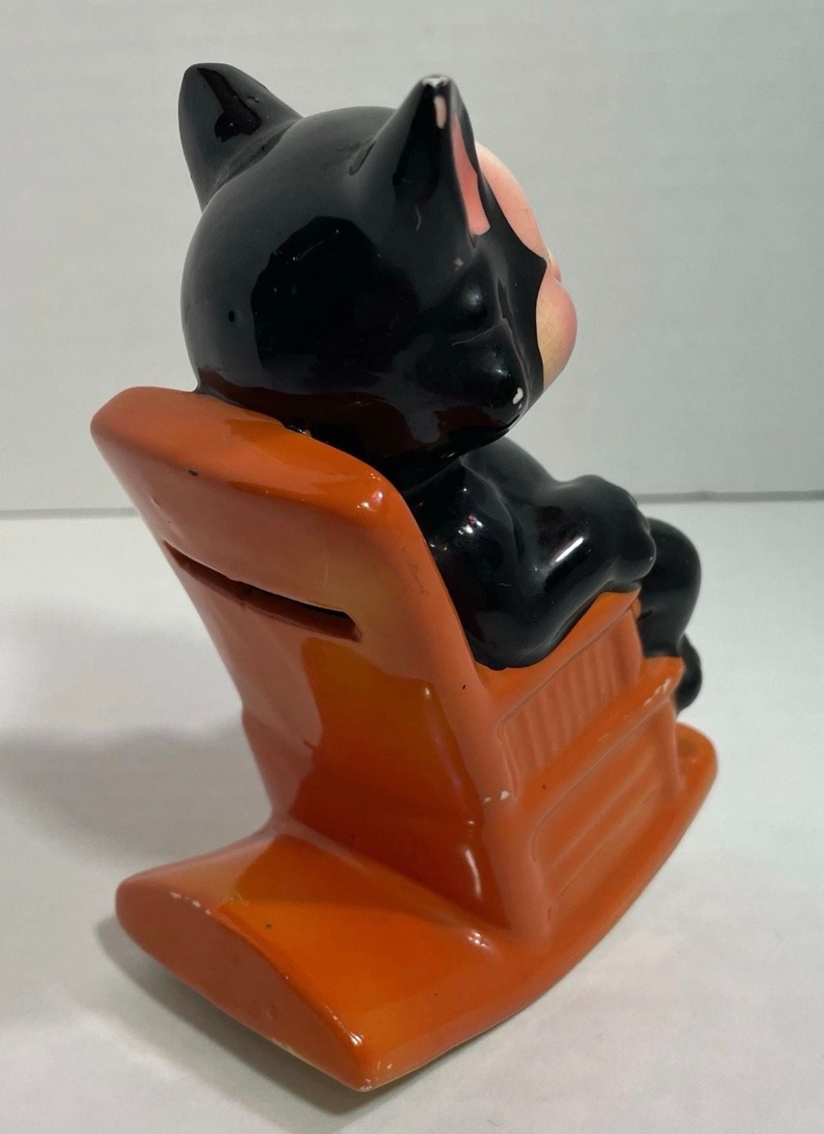 Vintage black cat in orange rocking chair ceramic coin bank Approx 1960s 10