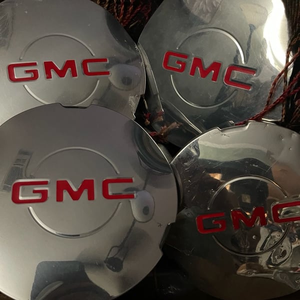 Set of 4 GMC Sierra 1500 /Suburban
Silver Red GMC Center Cap 99-02