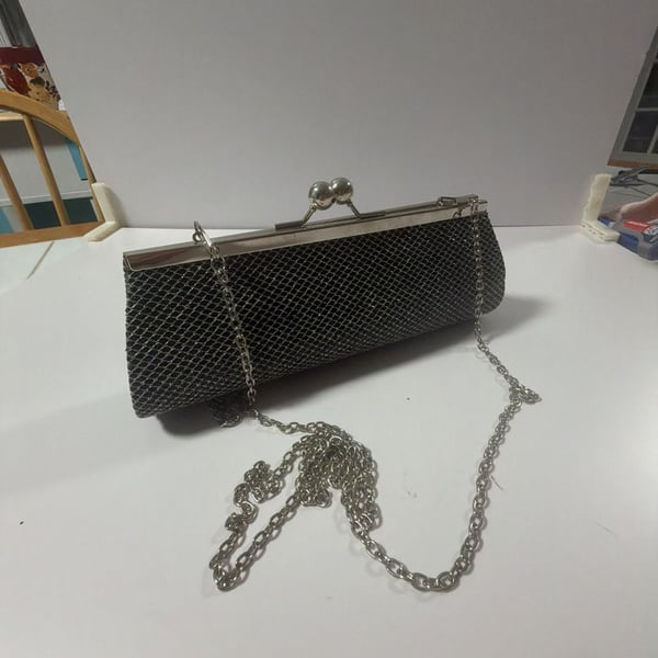 Black Metal Mesh Evening Clutch with Silver Tone Chain and Kiss Lock Clasp