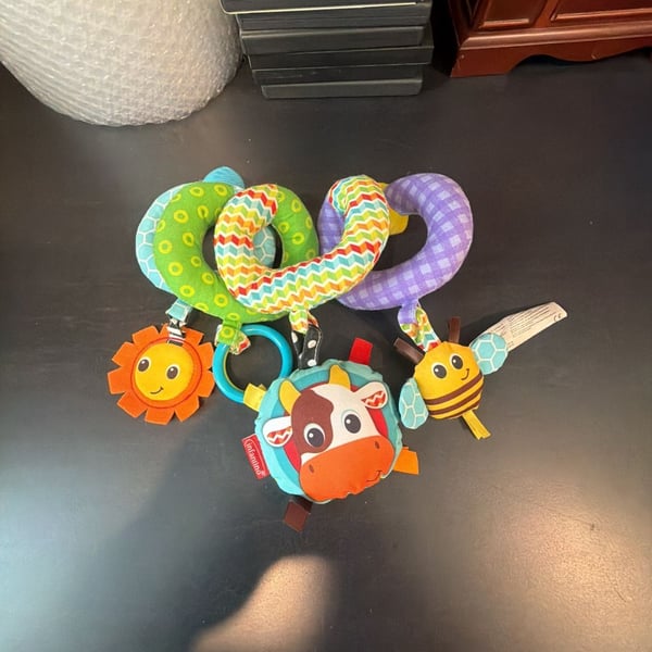 Infantino Spiral Activity Toy Farm Fun with Cow, Pig, Bee, and Sun Rattles