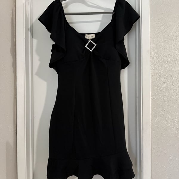 Derek Heart Women's Black Ruffle Sleeve Mini Dress with Rhinestone Brooch Detail