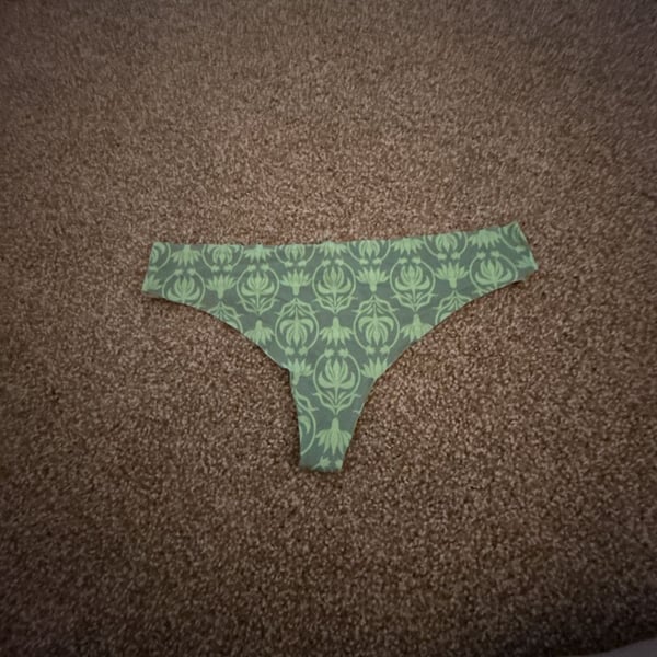 Auden Women's Invisible Edge Thong Panty in Lotus Floral Green