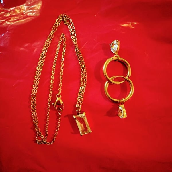 Gold Tone Emerald-Cut Crystal Pendant Necklace and Teardrop Hoop Earrings Set