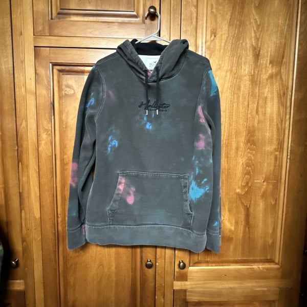 Hollister Must-Have Collection Men's Black Pullover Hoodie with Blue and Pink Tie-Dye