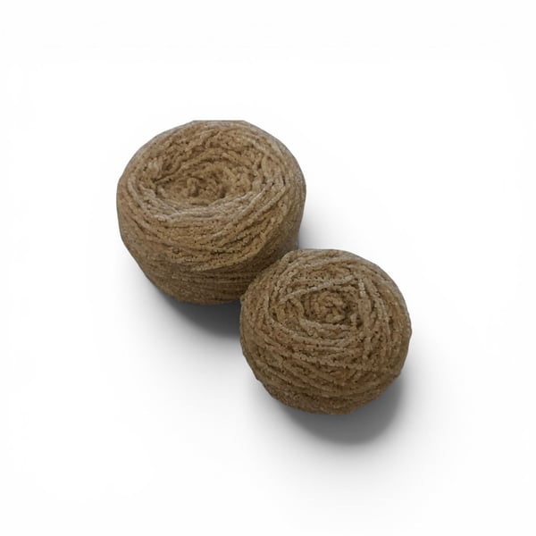 Two Velvet-y beige yarn cakes