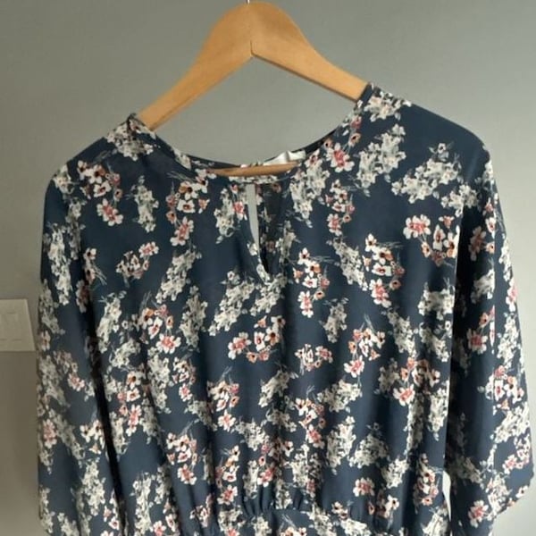Sienna Sky Women's Blue Floral Smocked Hem Blouse with Flutter Sleeves