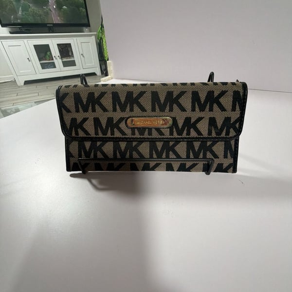 Michael Kors Austin Flat Continental Wallet in Black and Tan Monogram