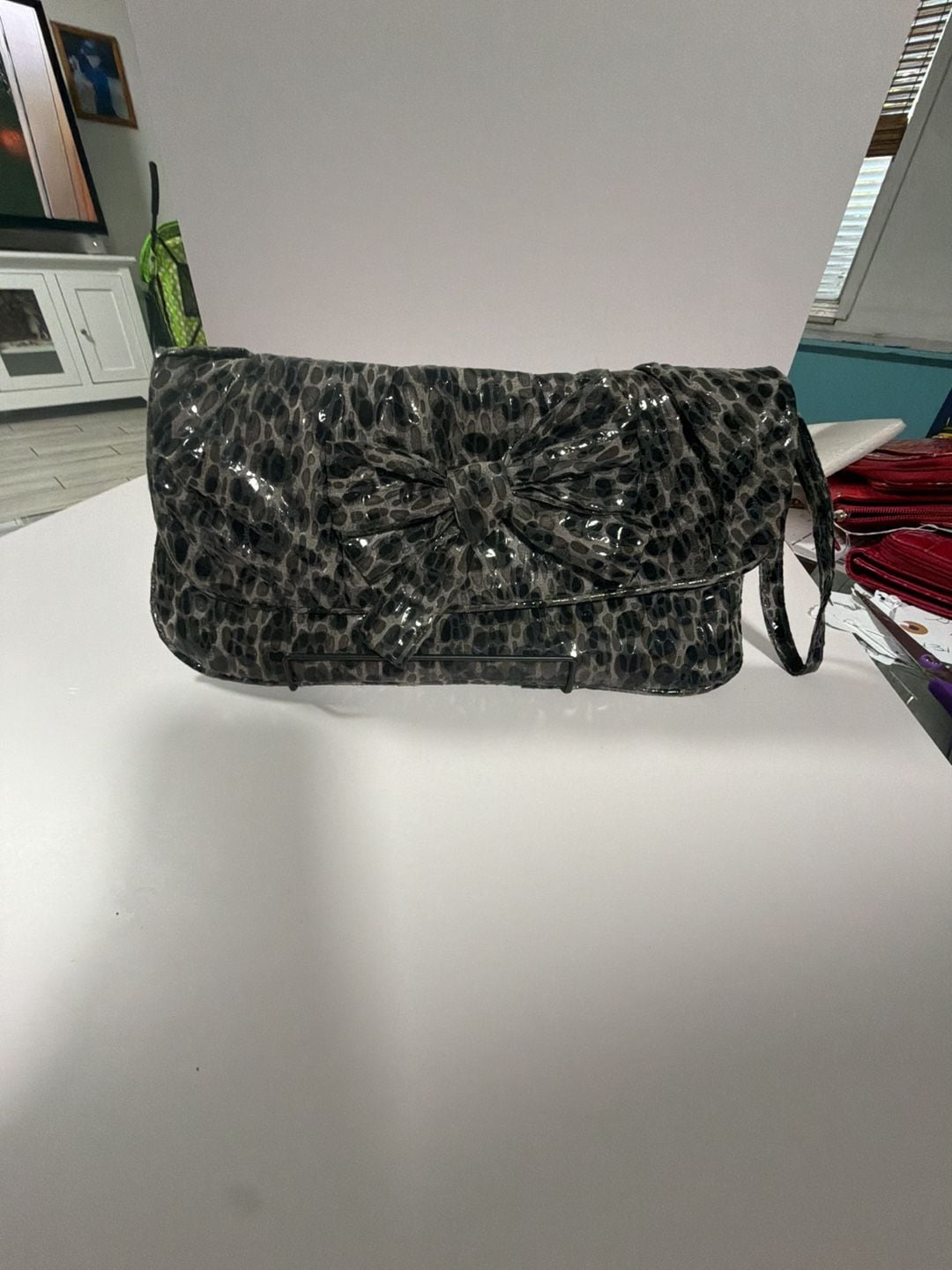 Black Leopard Print Patent Clutch with Bow Detail 1