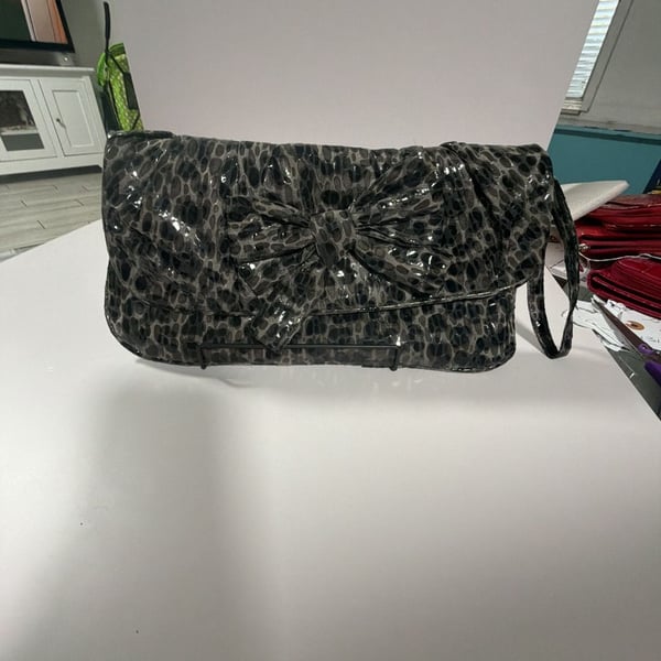 Black Leopard Print Patent Clutch with Bow Detail