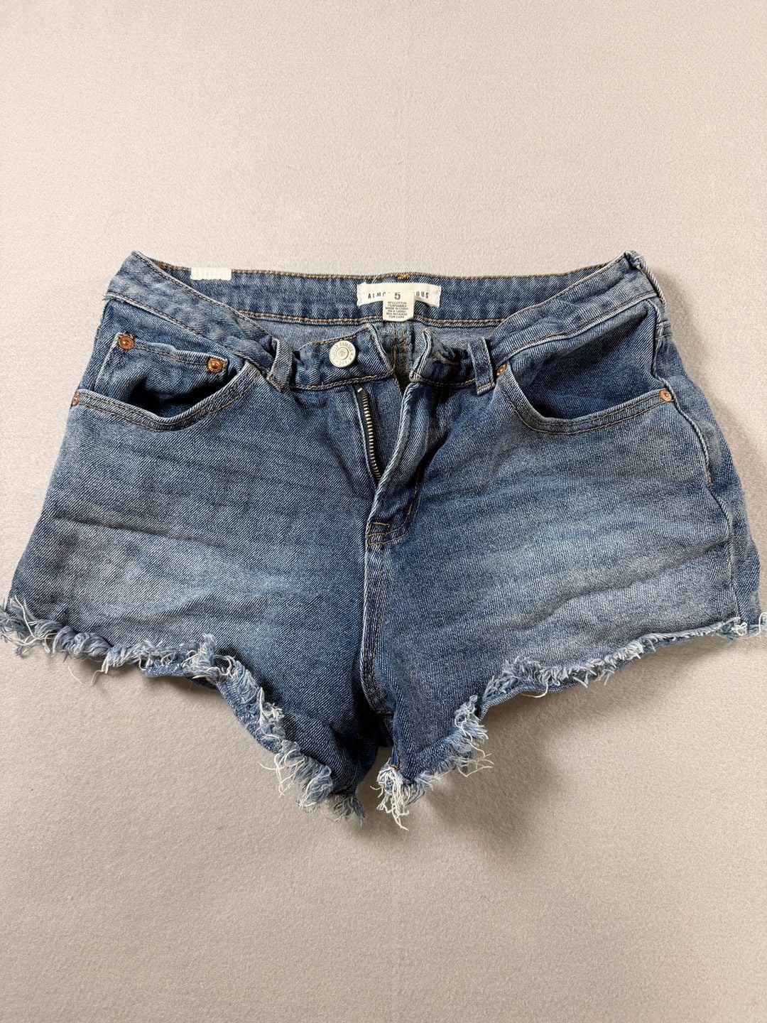 Almost Famous Women's Blue Denim Raw Hem Cutoff Shorts Size 5 2