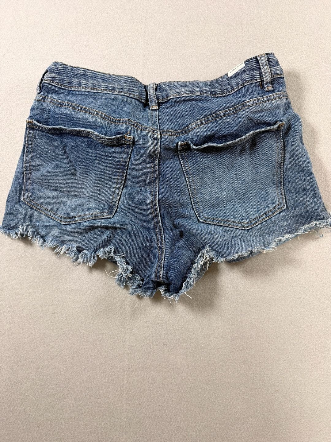 Almost Famous Women's Blue Denim Raw Hem Cutoff Shorts Size 5 4