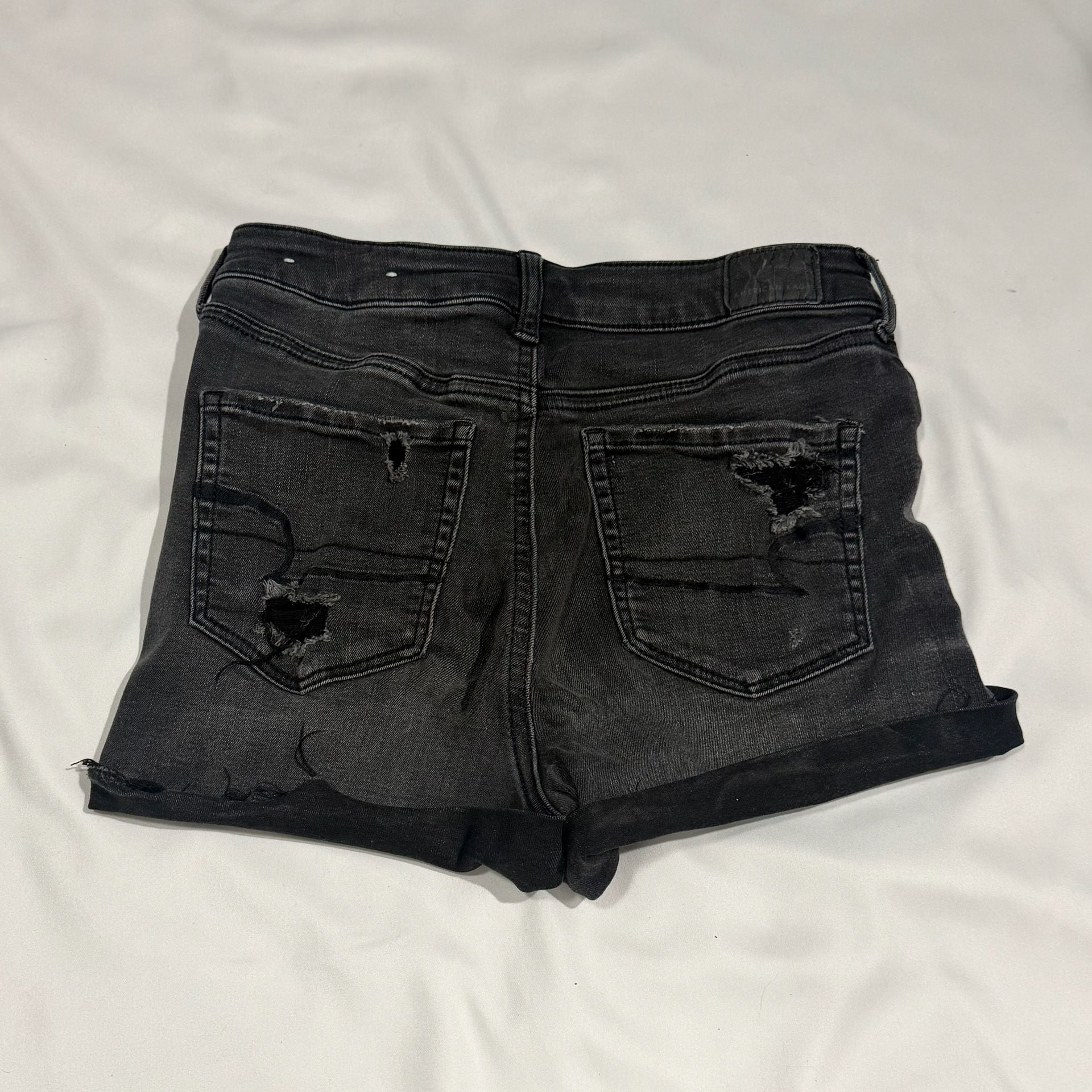American Eagle Super Hi-Rise Next Level Stretch Black Distressed Button-Fly Shorties 3