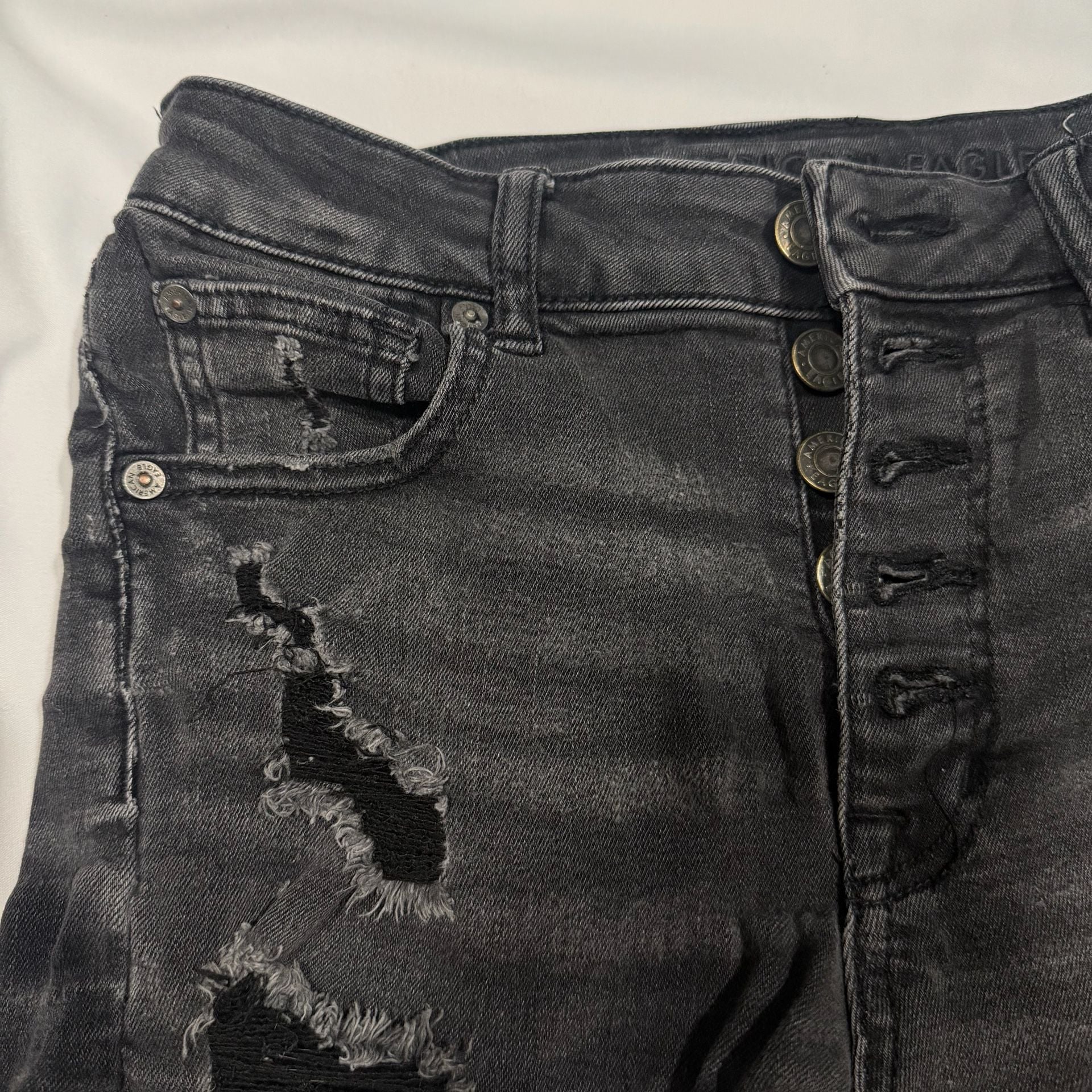 American Eagle Super Hi-Rise Next Level Stretch Black Distressed Button-Fly Shorties 4