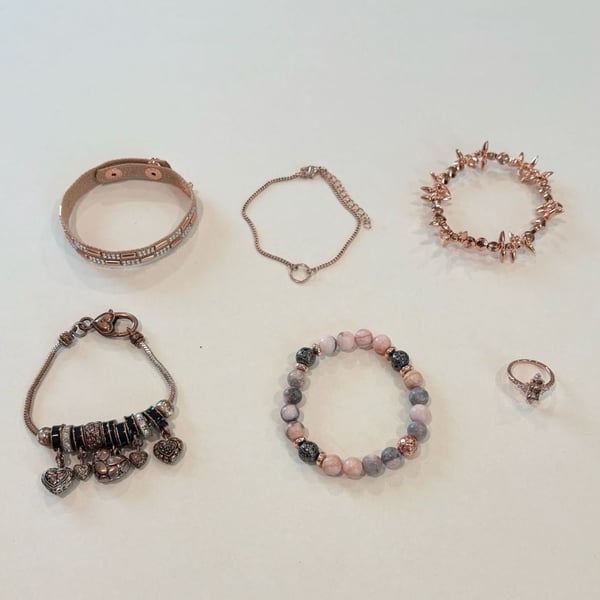 Set of 5 Rose Gold Tone Fashion Bracelets, a Ring and a Charm