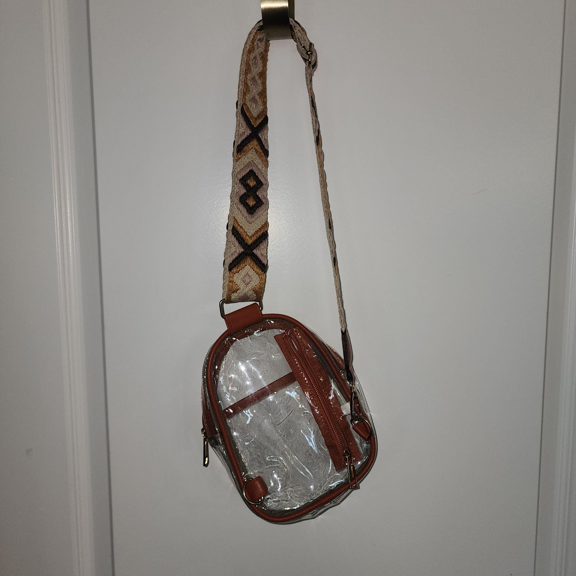 Clear Sling Crossbody Bag with Brown Trim and Patterned Guitar-Style Strap 2