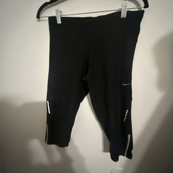Nike Women's Dri-Fit Running Capri Leggings with Zipper Pocket and Reflective Accents