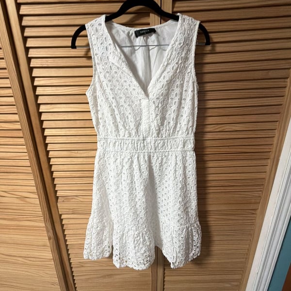 Zesica White Sleeveless V-Neck Eyelet Ruffle Hem Mini Dress