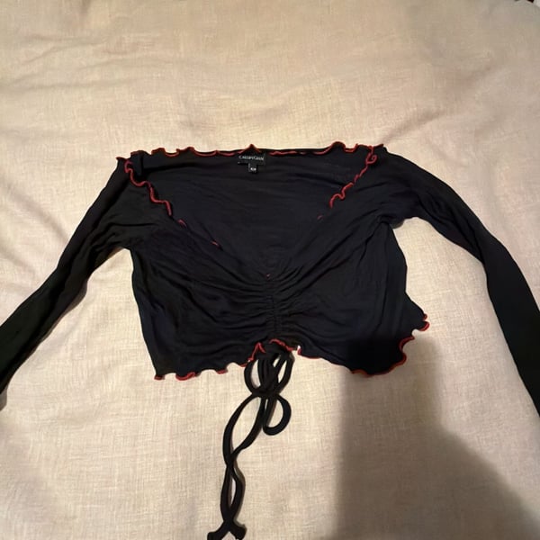 Callipigian Black Long Sleeve Cropped Drawstring Top with Red Lettuce Edge Trim