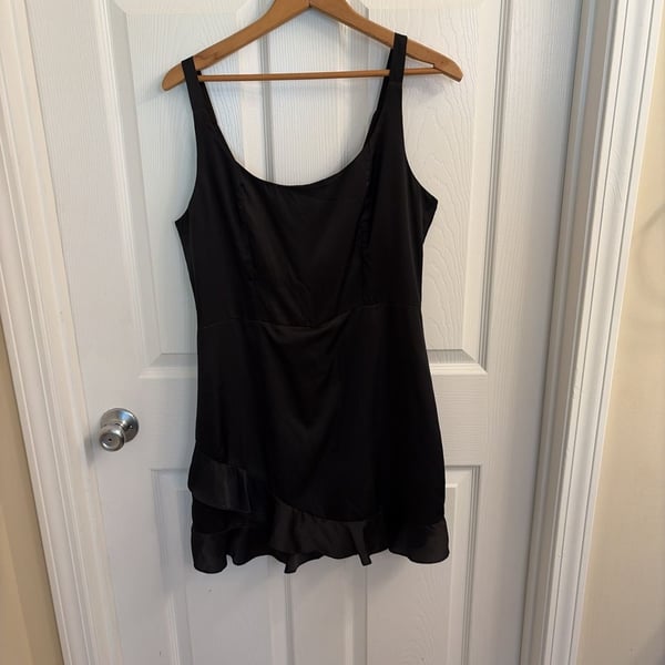Le Lis Collection Black Satin Sleeveless Mini Dress with Ruffle Hem