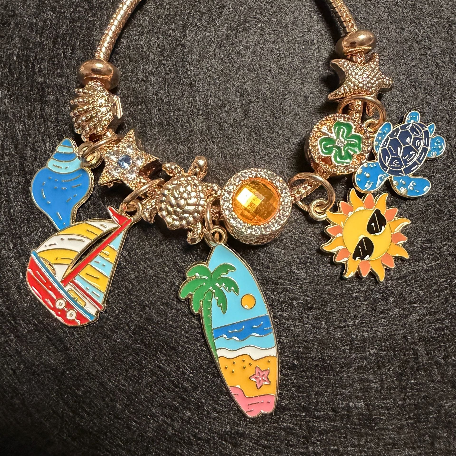 3-Piece Bundle: Tropical Sailboat Romper XS, Straw Hat, & Charm Bracelet 7