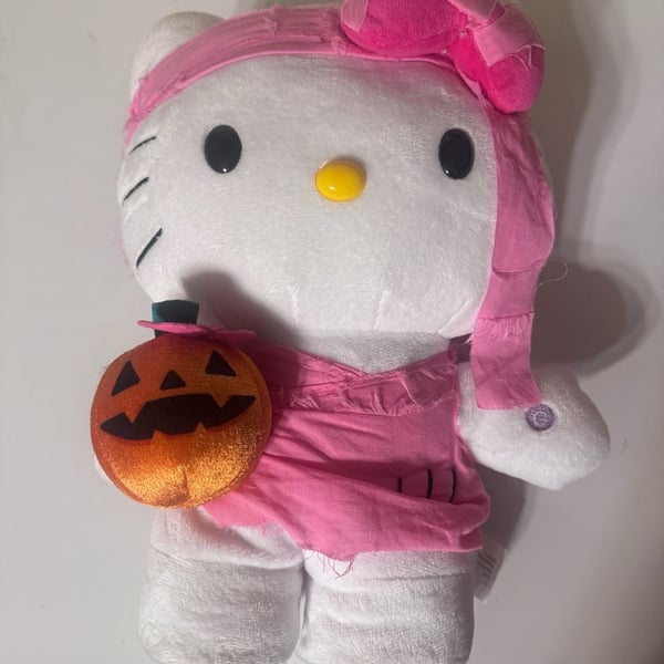 Gemmy Industries Hello Kitty Halloween Pink Mummy Animated Dancing Side Stepper Plush