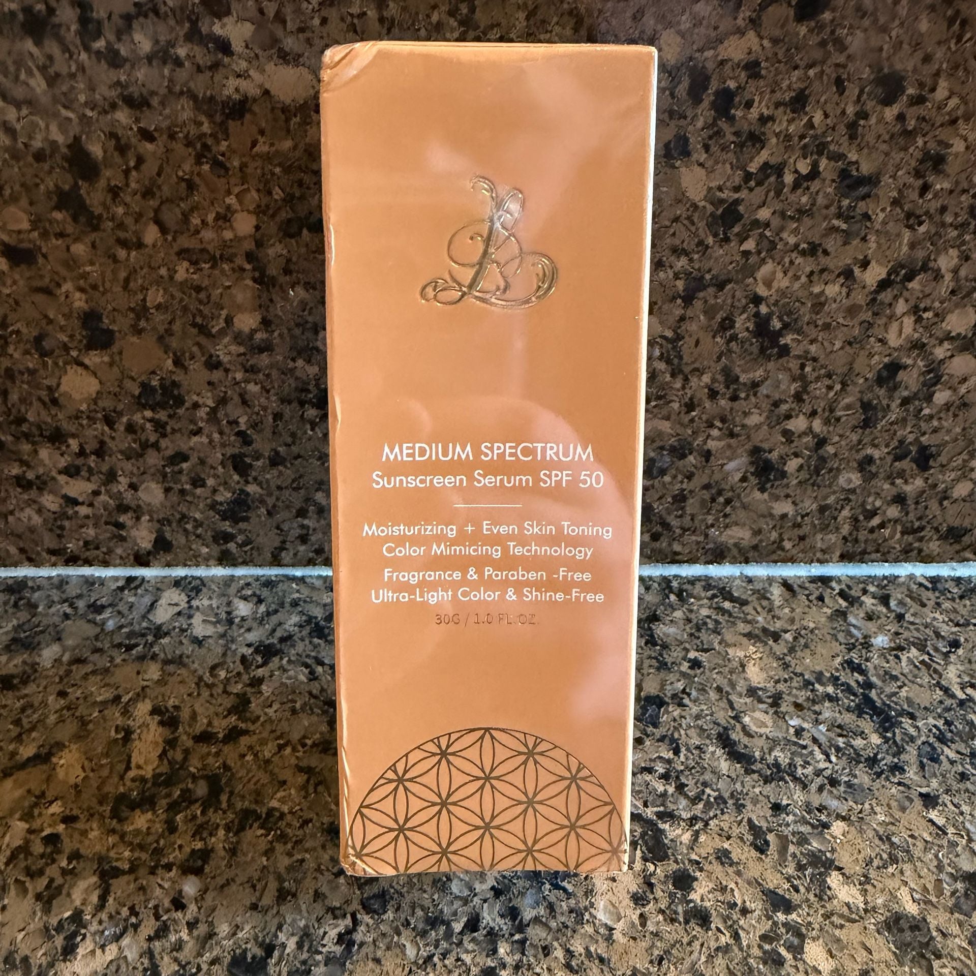 Medium Spectrum Sunscreen Serum SPF 50 Color Mimicking Foundation 1