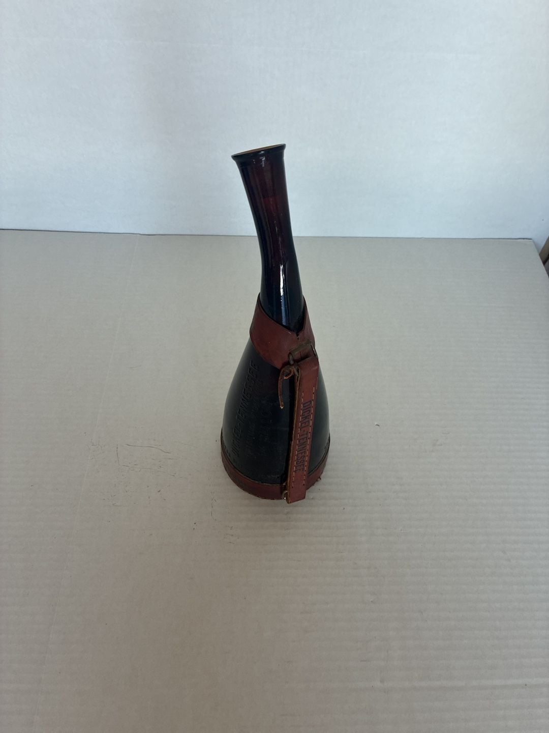 Vintage George Dickel Tennessee Whiskey Amber Glass Powder with Leather Harness 1