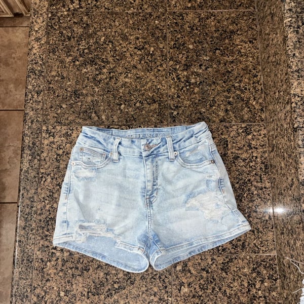 American Eagle Next Level Stretch High-Waisted Distressed Denim Shorts