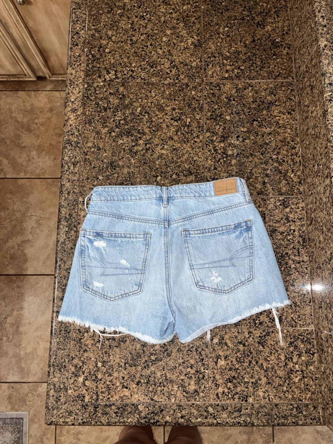 American Eagle Women's Light Wash Distressed Denim Cutoff Shorts with Sunflower Patchwork Detail, Size 2 3