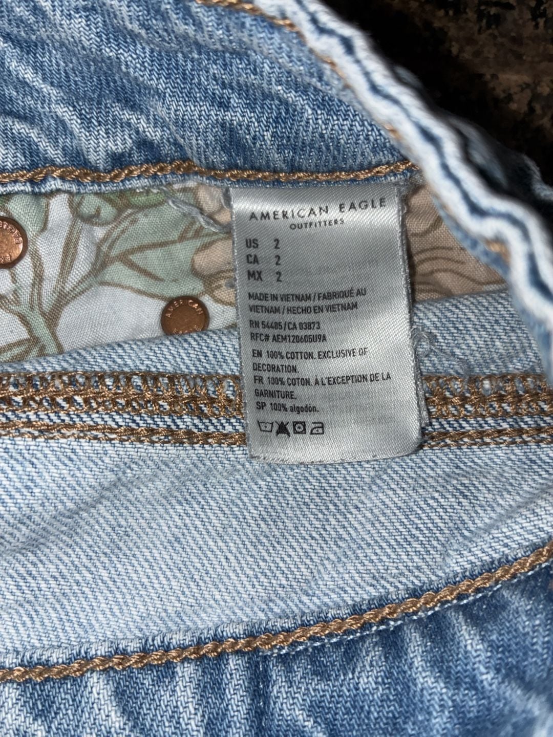 American Eagle Women's Light Wash Distressed Denim Cutoff Shorts with Sunflower Patchwork Detail, Size 2 4