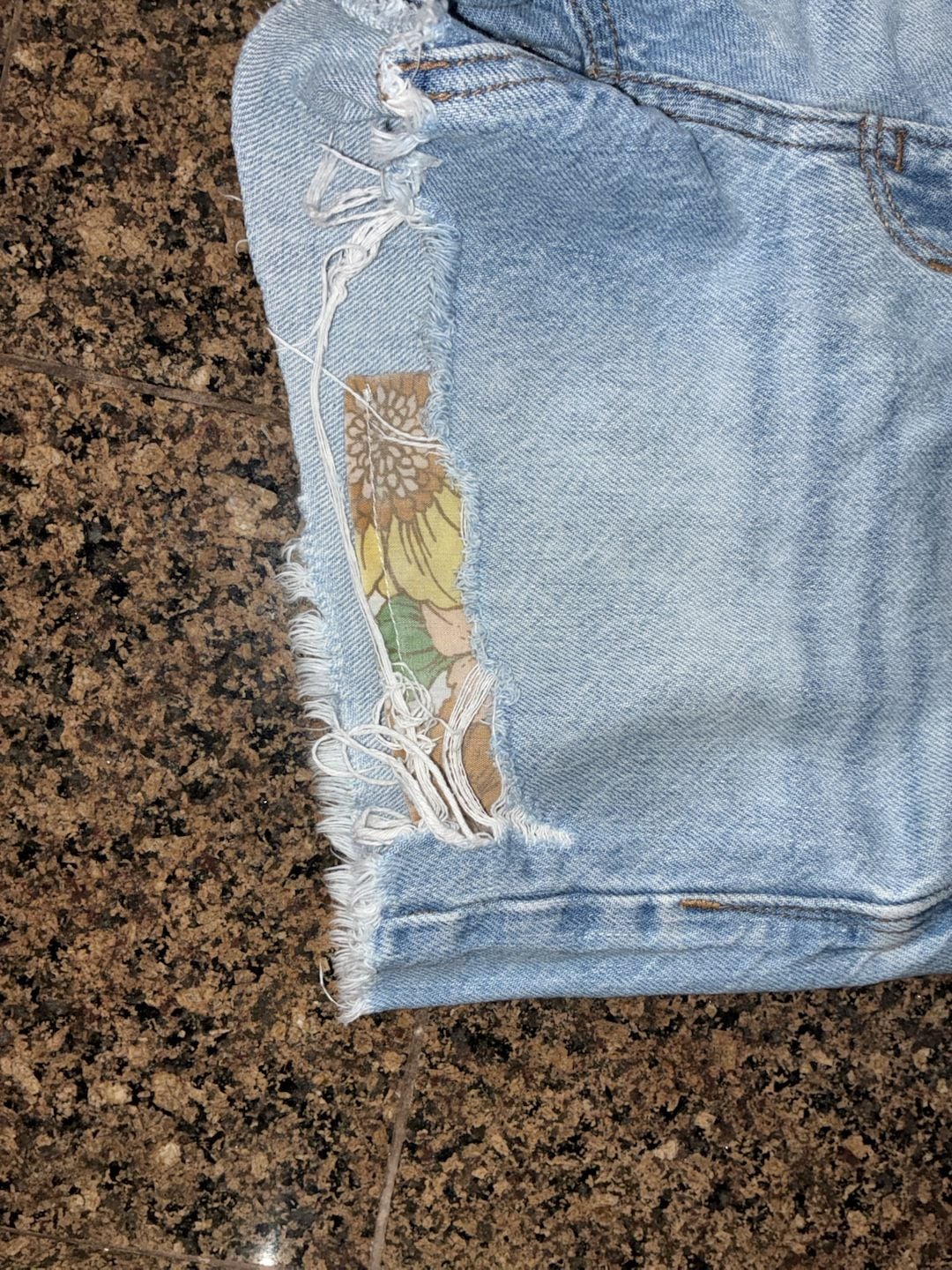 American Eagle Women's Light Wash Distressed Denim Cutoff Shorts with Sunflower Patchwork Detail, Size 2 5