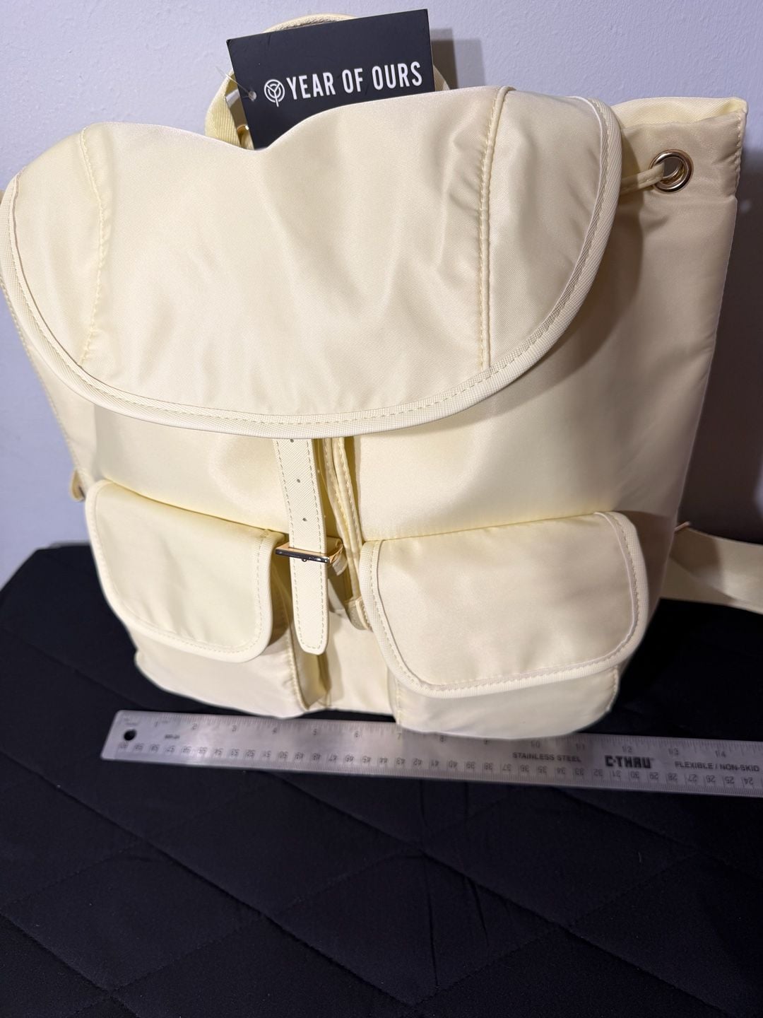Year of Ours Nylon Drawstring Lightweight Backpack in Butter Yellow 9