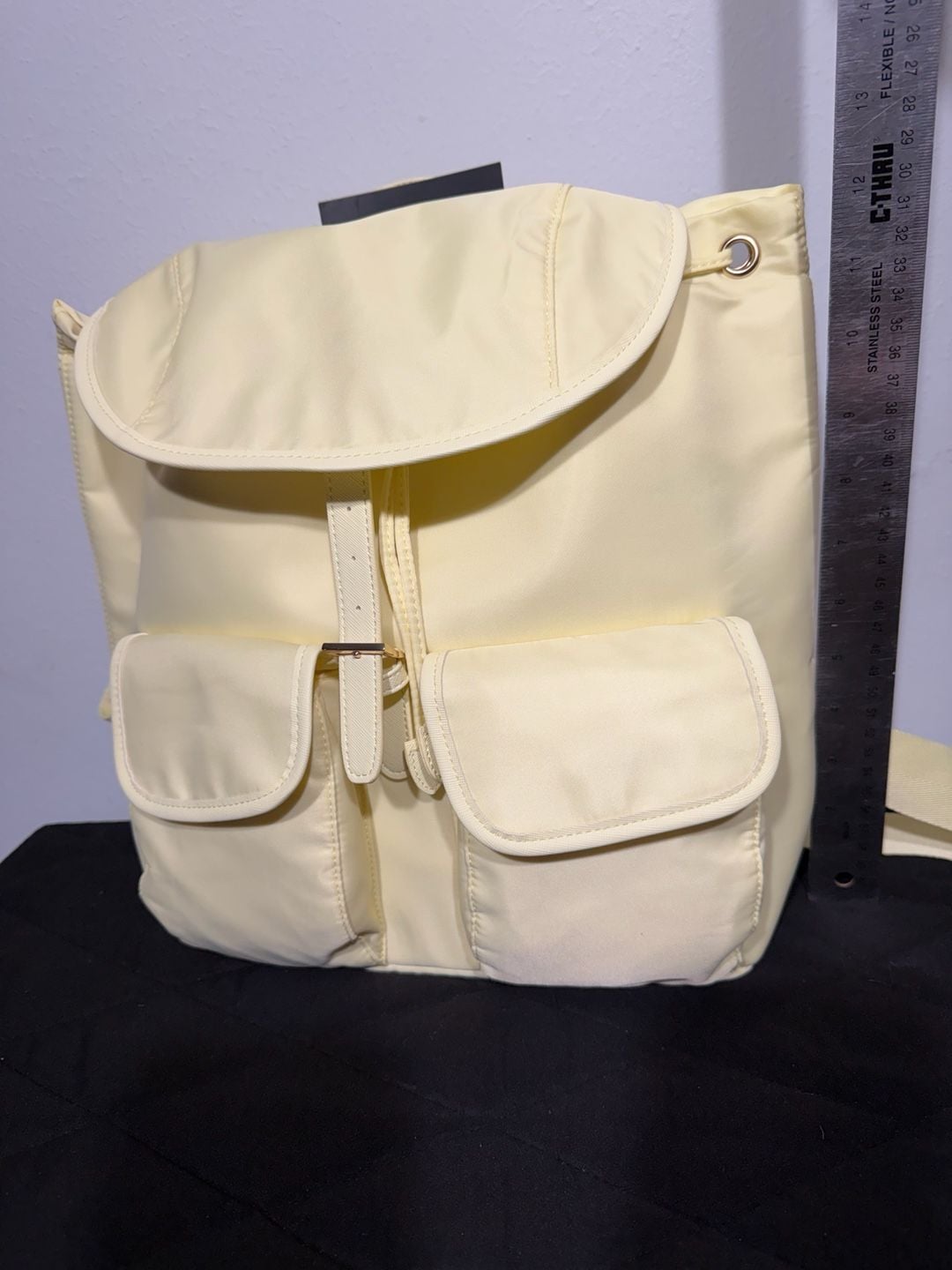 Year of Ours Nylon Drawstring Lightweight Backpack in Butter Yellow 11