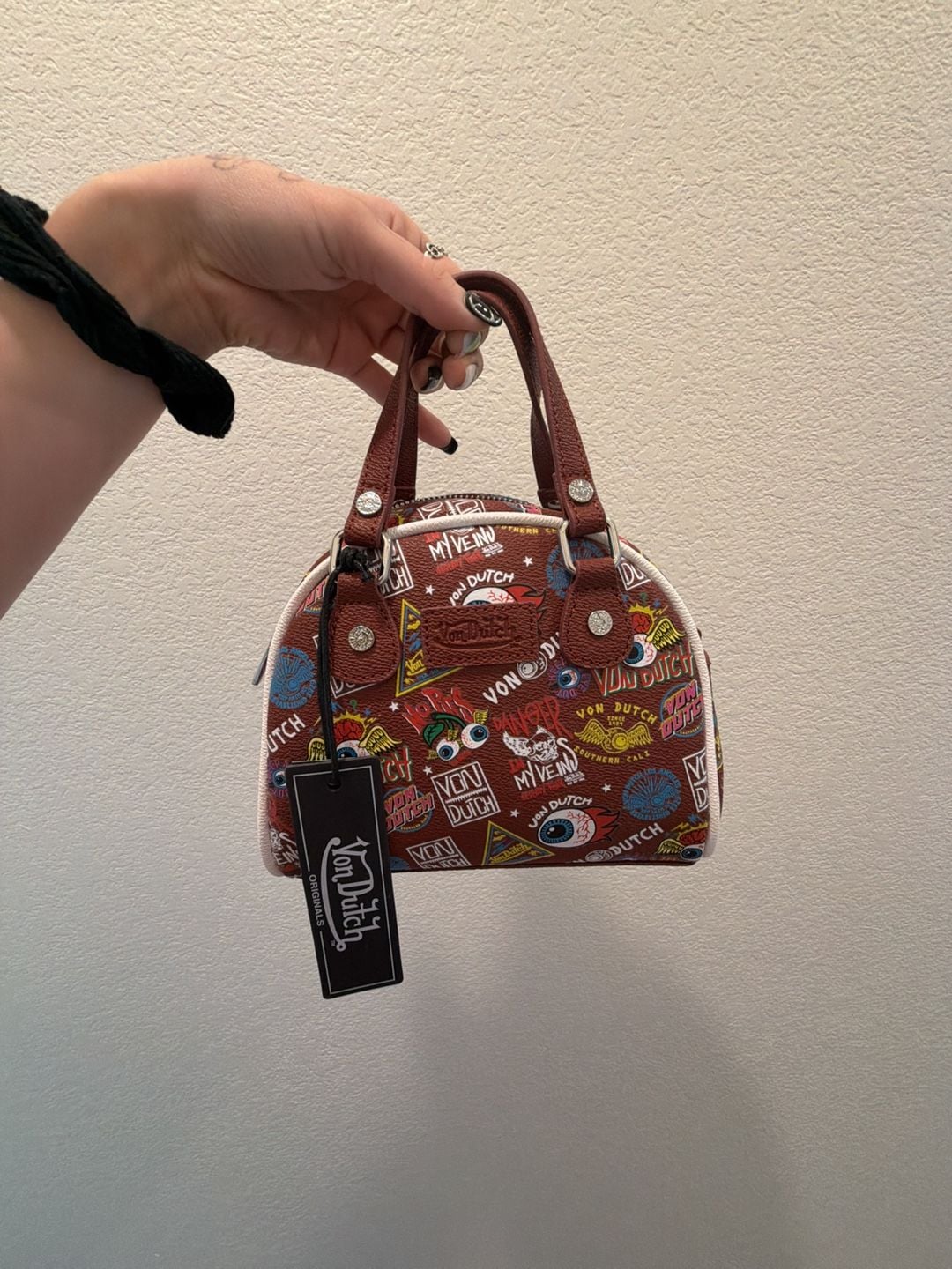 Von Dutch Jax Bowling Bag in Brown with Multi-Color Graphic Logo Print 2