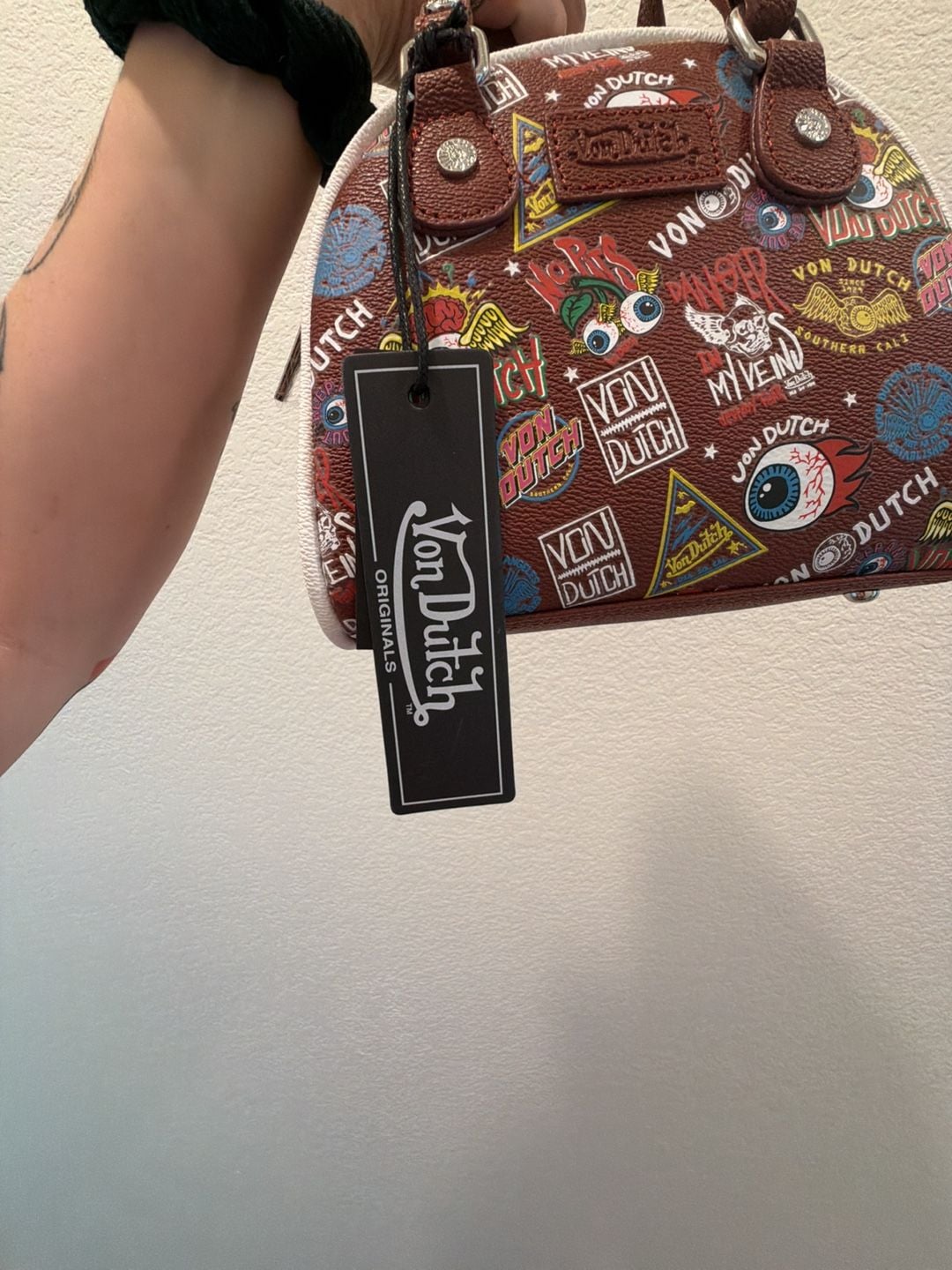 Von Dutch Jax Bowling Bag in Brown with Multi-Color Graphic Logo Print 3