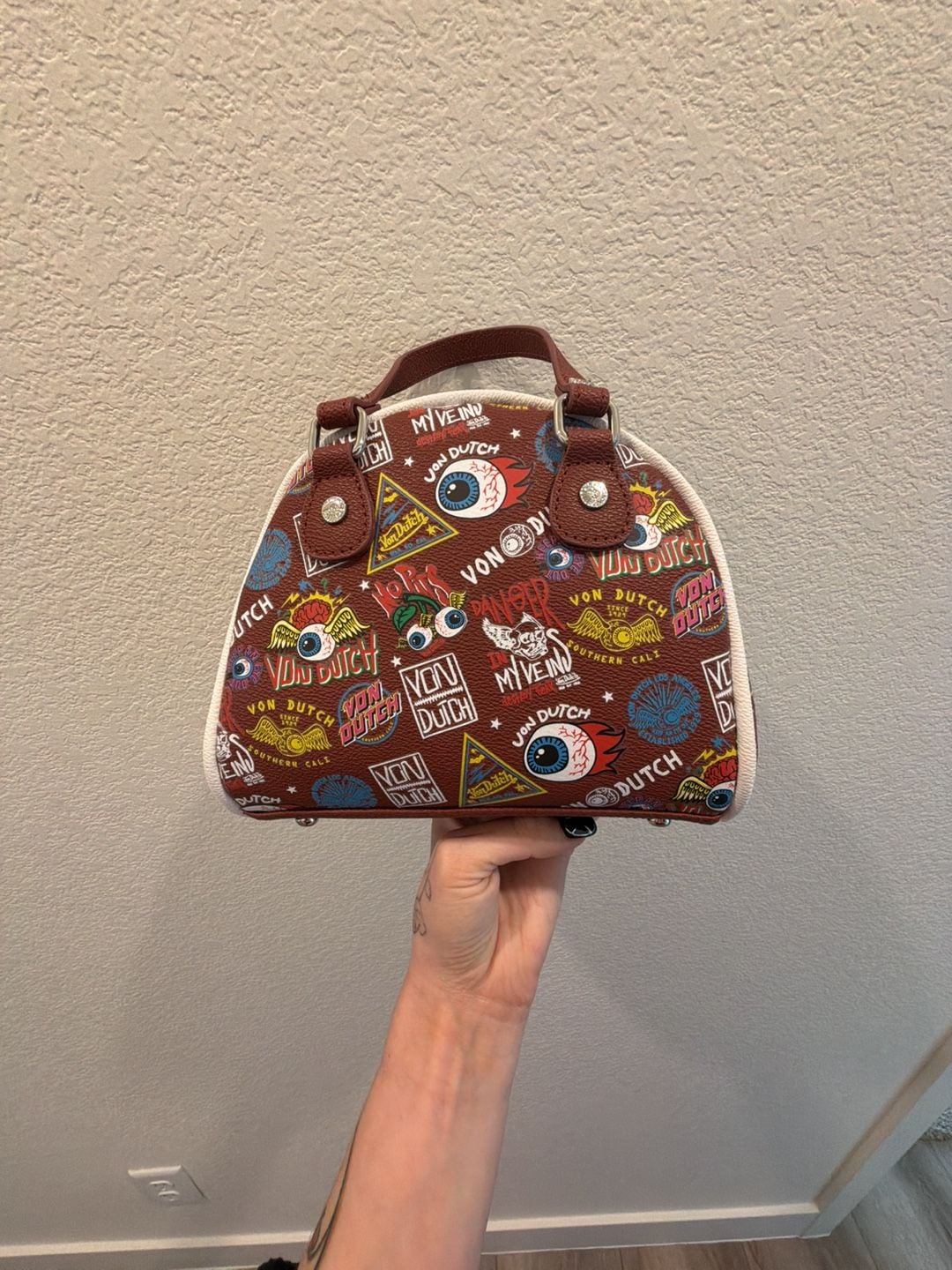 Von Dutch Jax Bowling Bag in Brown with Multi-Color Graphic Logo Print 6