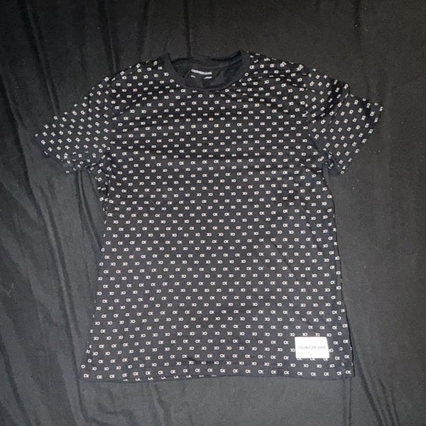 Calvin Klein Jeans black t-shirt with CK logo all-over print