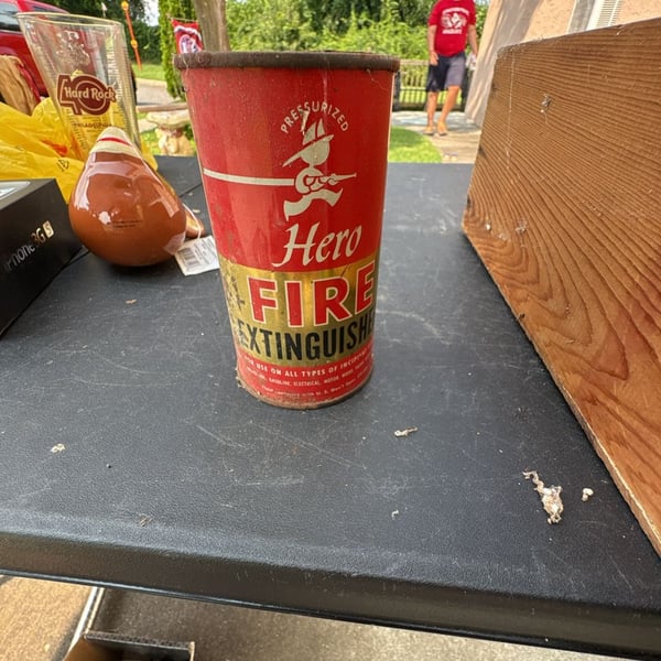 Vintage Hero Pressurized Fire Extinguisher Can there’s 2 of them