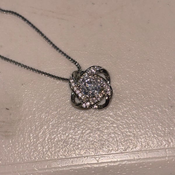 Cubic Zirconia Knot Pendant Necklace in Sterling Silver